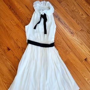 Elegant White Sleeveless Dress with Black Accents